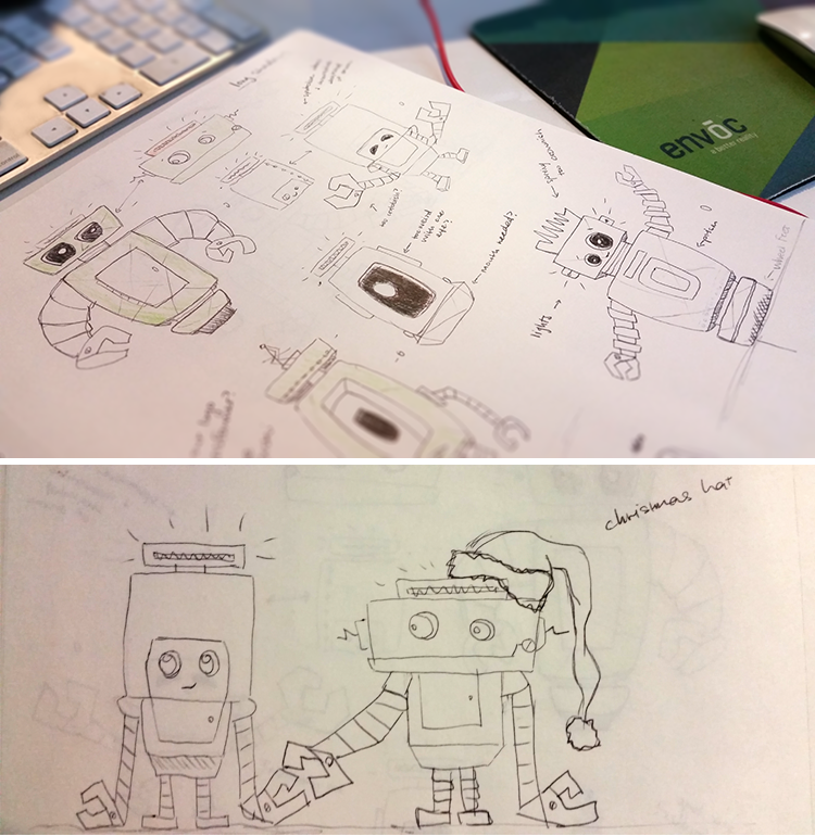 Close-up of detailed hand sketches of Obots characters